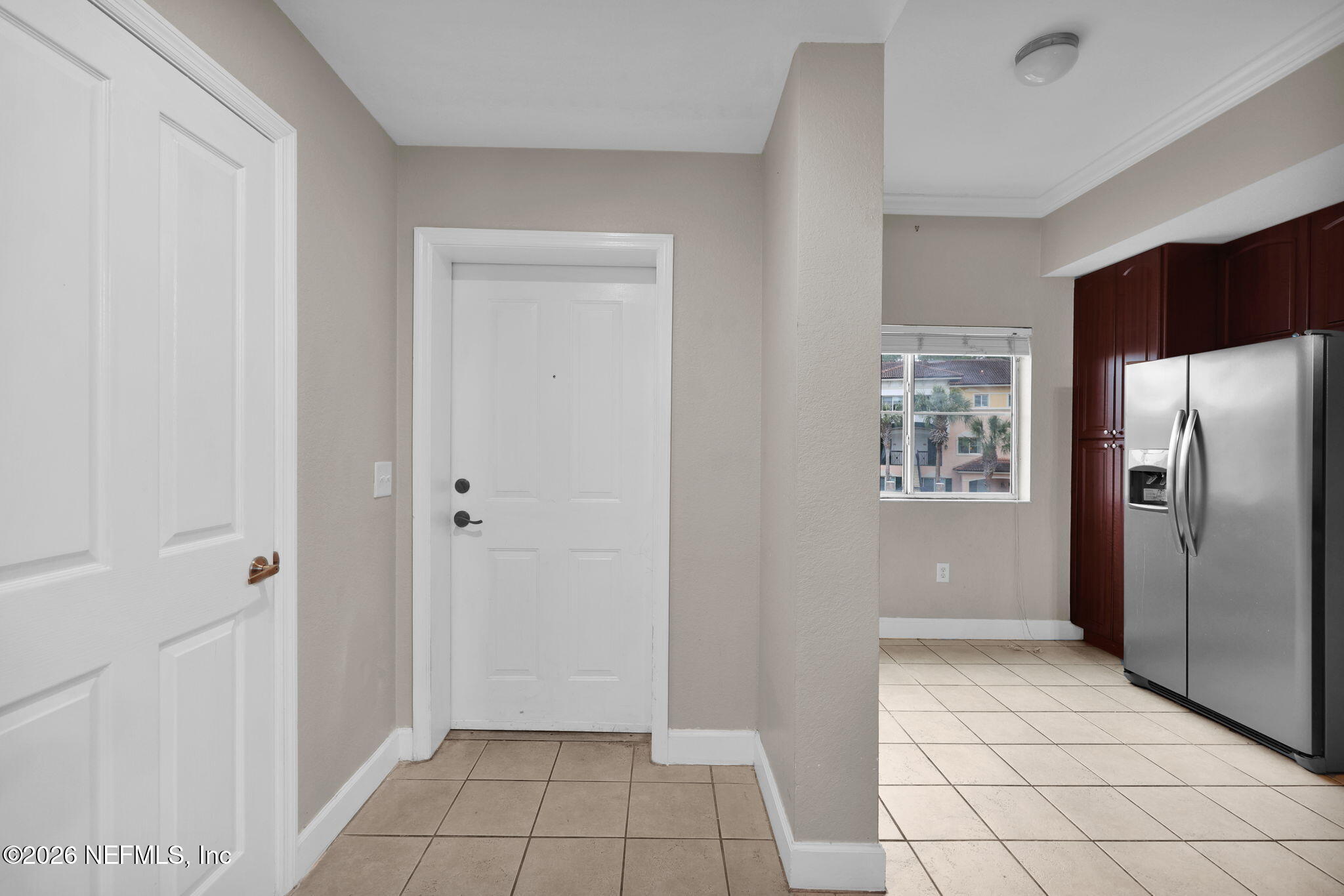 9745 Touchton Road, Unit 526 Jacksonville, FL 32246 - Photo 9 of 34 a view of an empty room with an entryway