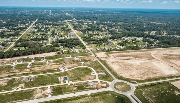 a backyard of a house with lots of green space