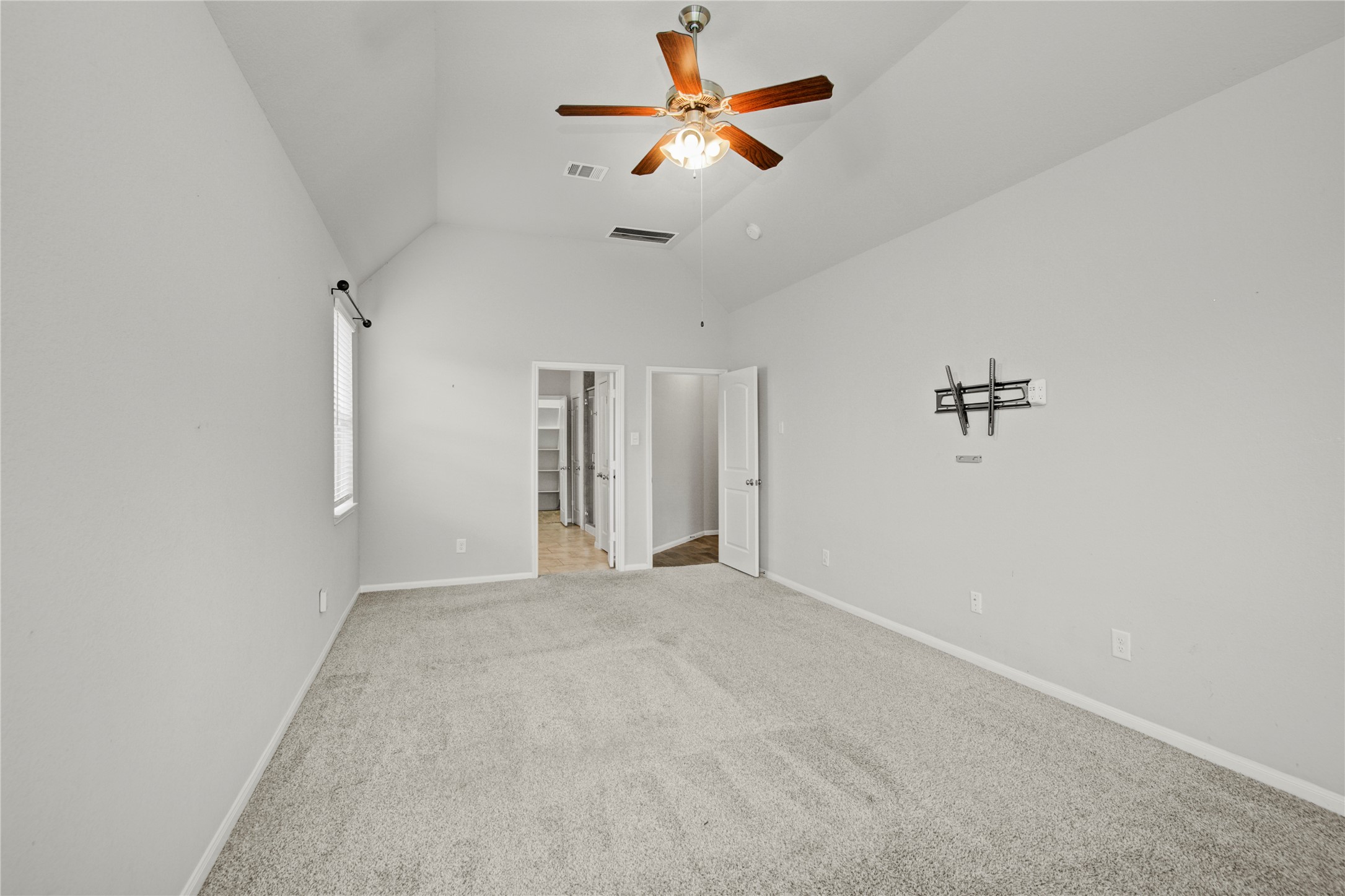 1314 Orchard Ridge Lane Tomball, TX 77375 - Photo 21 of 35 The primary suite offers a private transition into the ensuite bath with a well-proportioned layout.