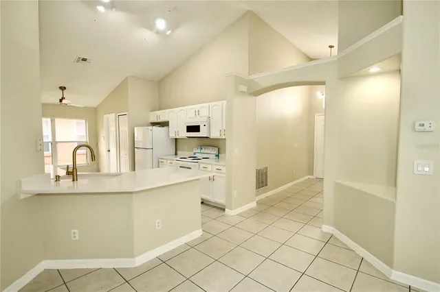 a bathroom with a double vanity sink mirror and