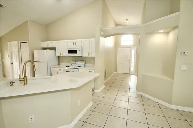 a bathroom with a bathtub and a sink