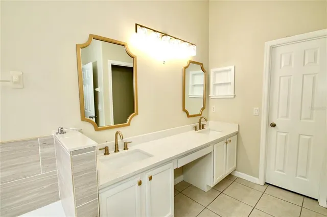 a view of house with yard and green space