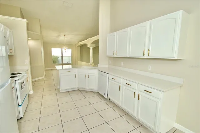 a bathroom with a sink a mirror and a shower