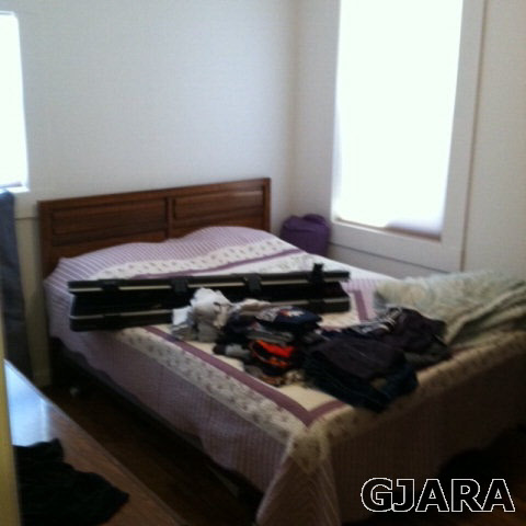236 29 Road Grand Junction, CO 81503 - Photo 3 of 9 a bed sitting in a bedroom next to a window