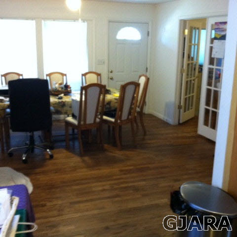 236 29 Road Grand Junction, CO 81503 - Photo 6 of 9 a view of a dining room with furniture and wooden floor