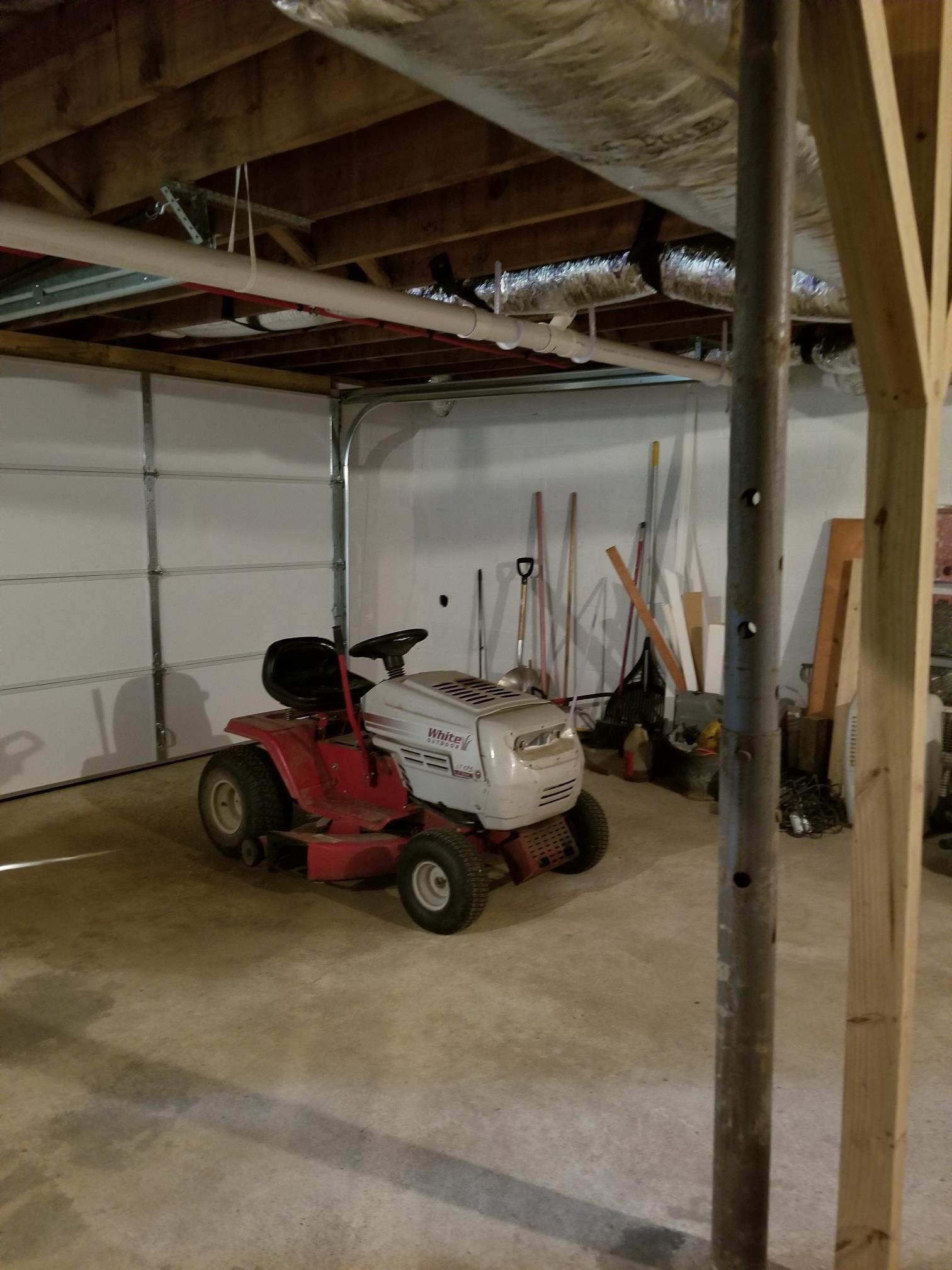 480 Eno Road Dickson, TN 37055 - Photo 13 of 14 a car parked in garage