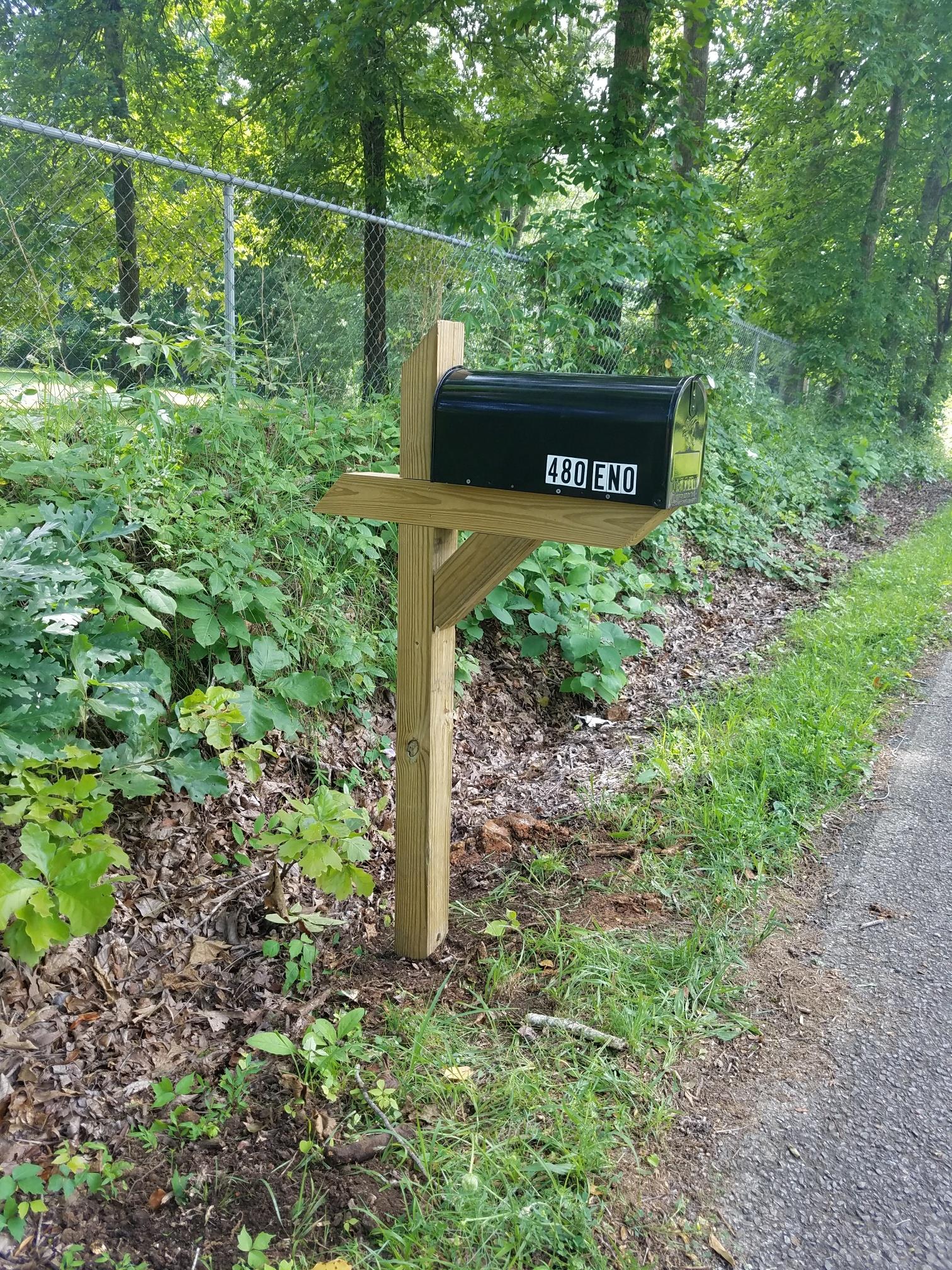 480 Eno Road Dickson, TN 37055 - Photo 14 of 14 a sign that is sitting in front of a tree