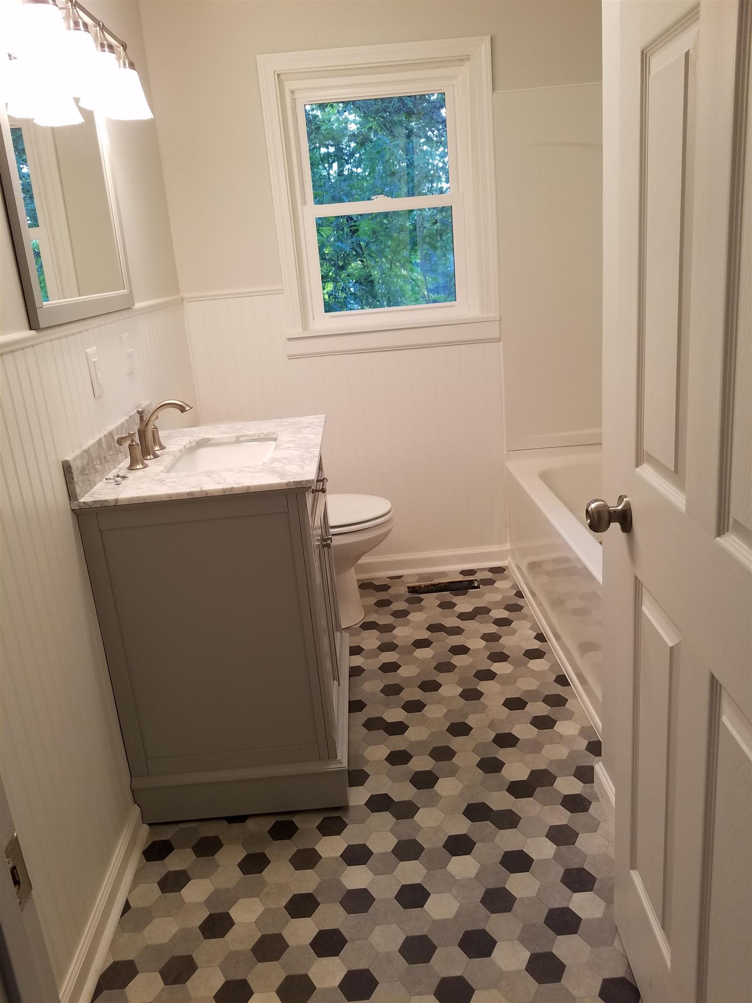 480 Eno Road Dickson, TN 37055 - Photo 8 of 14 a bathroom with a sink a toilet and a shower