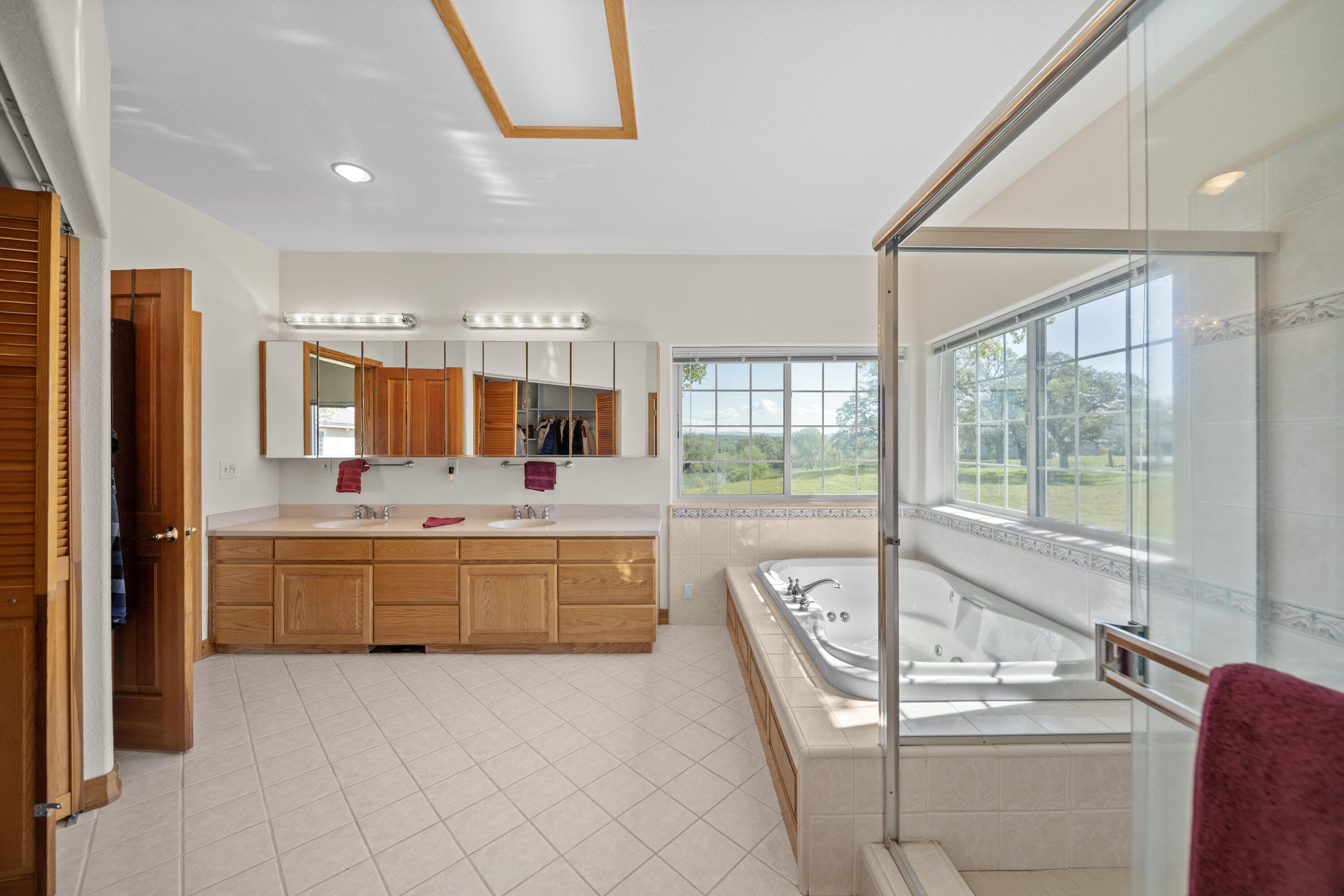 17935 Rivers Edge Drive Red Bluff, CA 96080 - Photo 19 of 38 a large kitchen with kitchen island a large window