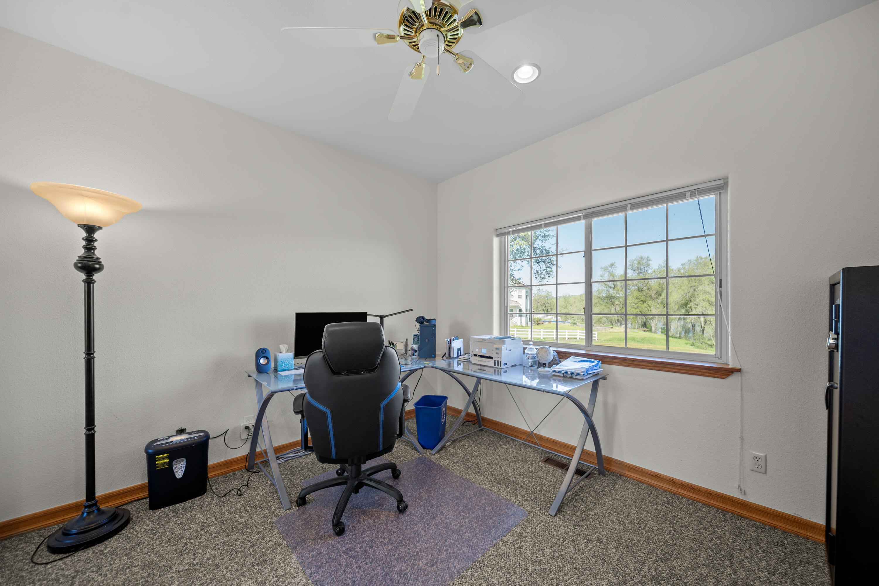 17935 Rivers Edge Drive Red Bluff, CA 96080 - Photo 28 of 38 a view of a workspace with furniture and a window