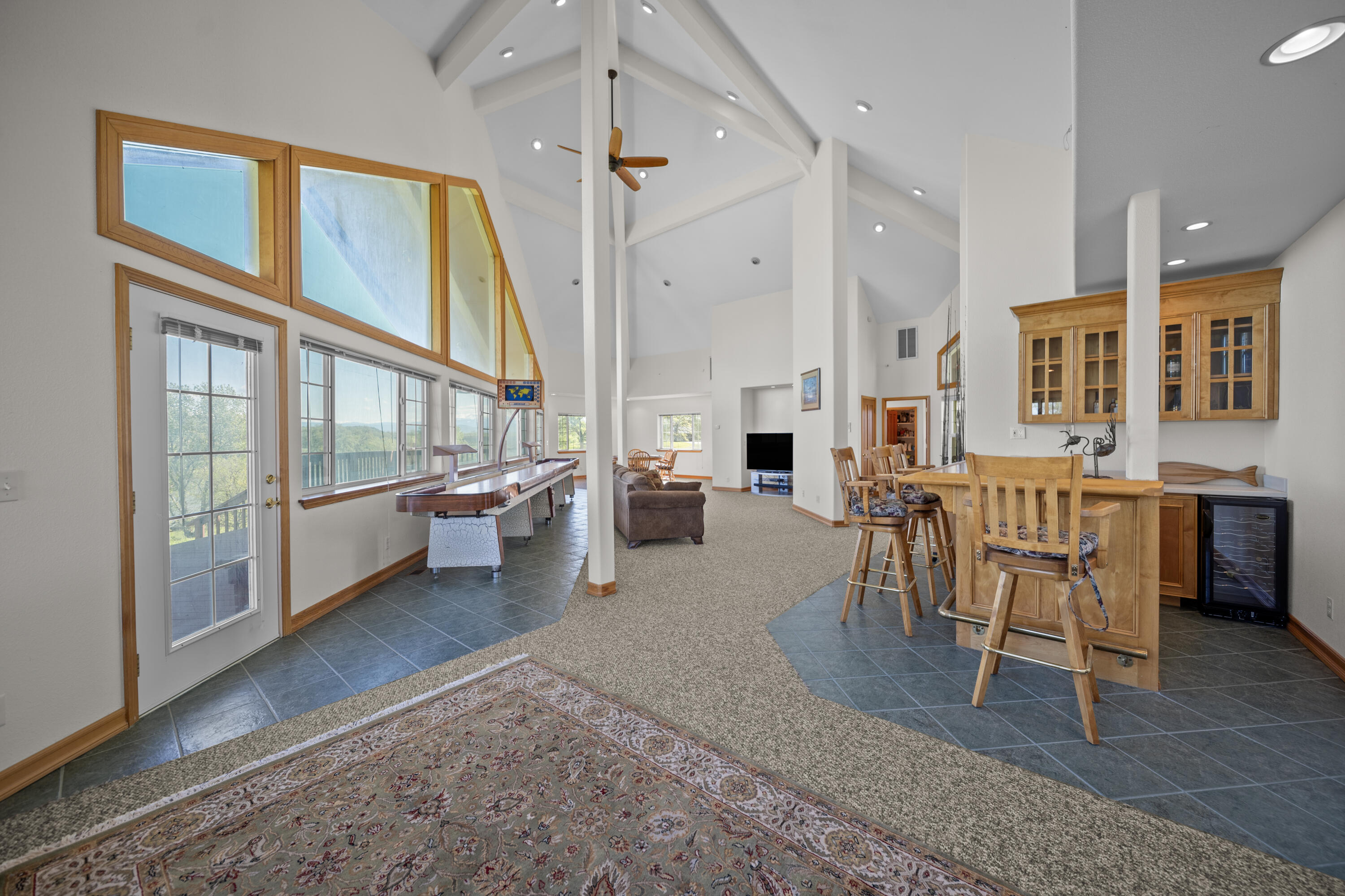 17935 Rivers Edge Drive Red Bluff, CA 96080 - Photo 7 of 38 a living room with furniture a large window and wooden floor