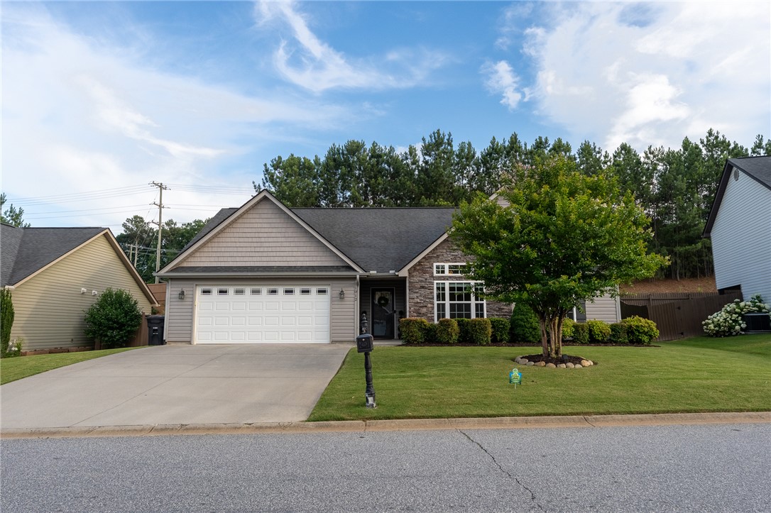 1012 Whirlaway Circle Anderson, SC 29621 - Photo 23 of 25 A charming ranch-style home presents an inviting facade with mixed siding and a meticulously kept front lawn.
