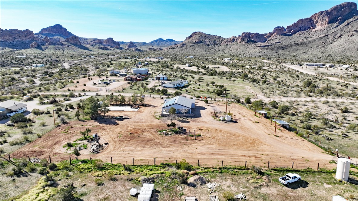 1790 Gleeson Road Golden Valley, AZ 86413 - Photo 58 of 62 Aerial view of sparsely populated area featuring a mountainous background and a desert landscape