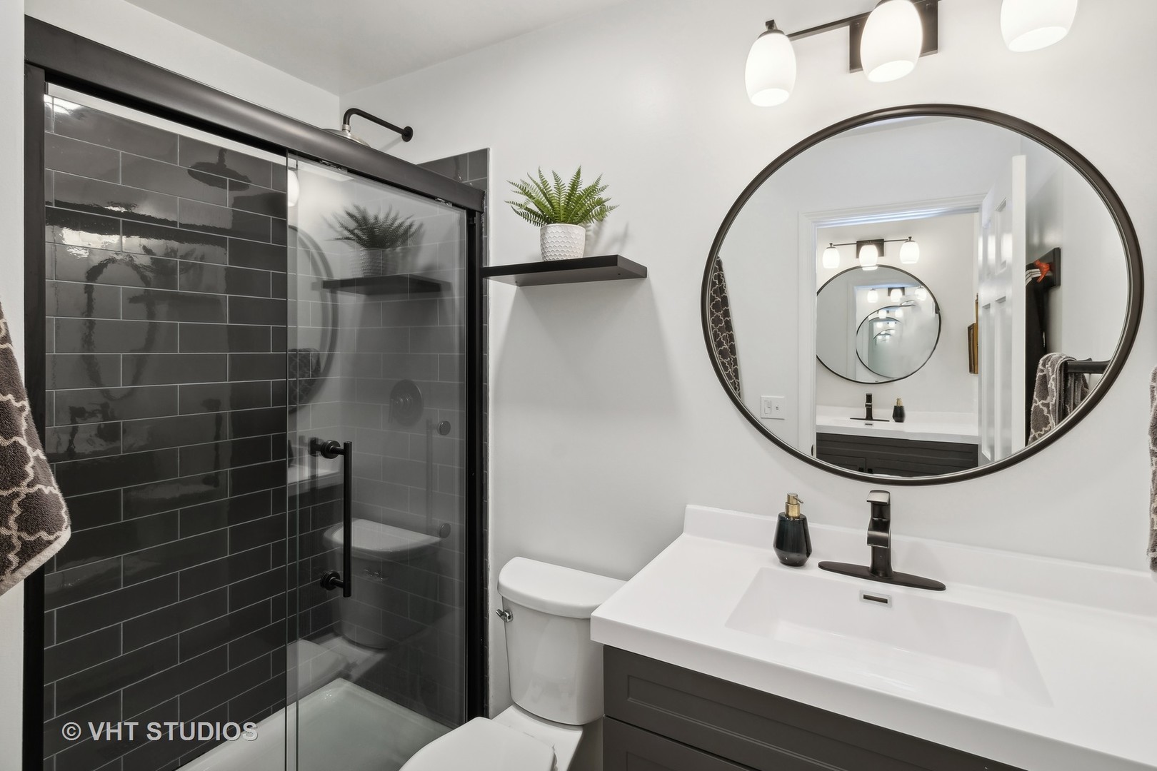 236 Foxmoor Road Fox River Grove, IL 60021 - Photo 16 of 28 a bathroom with a sink toilet and a mirror