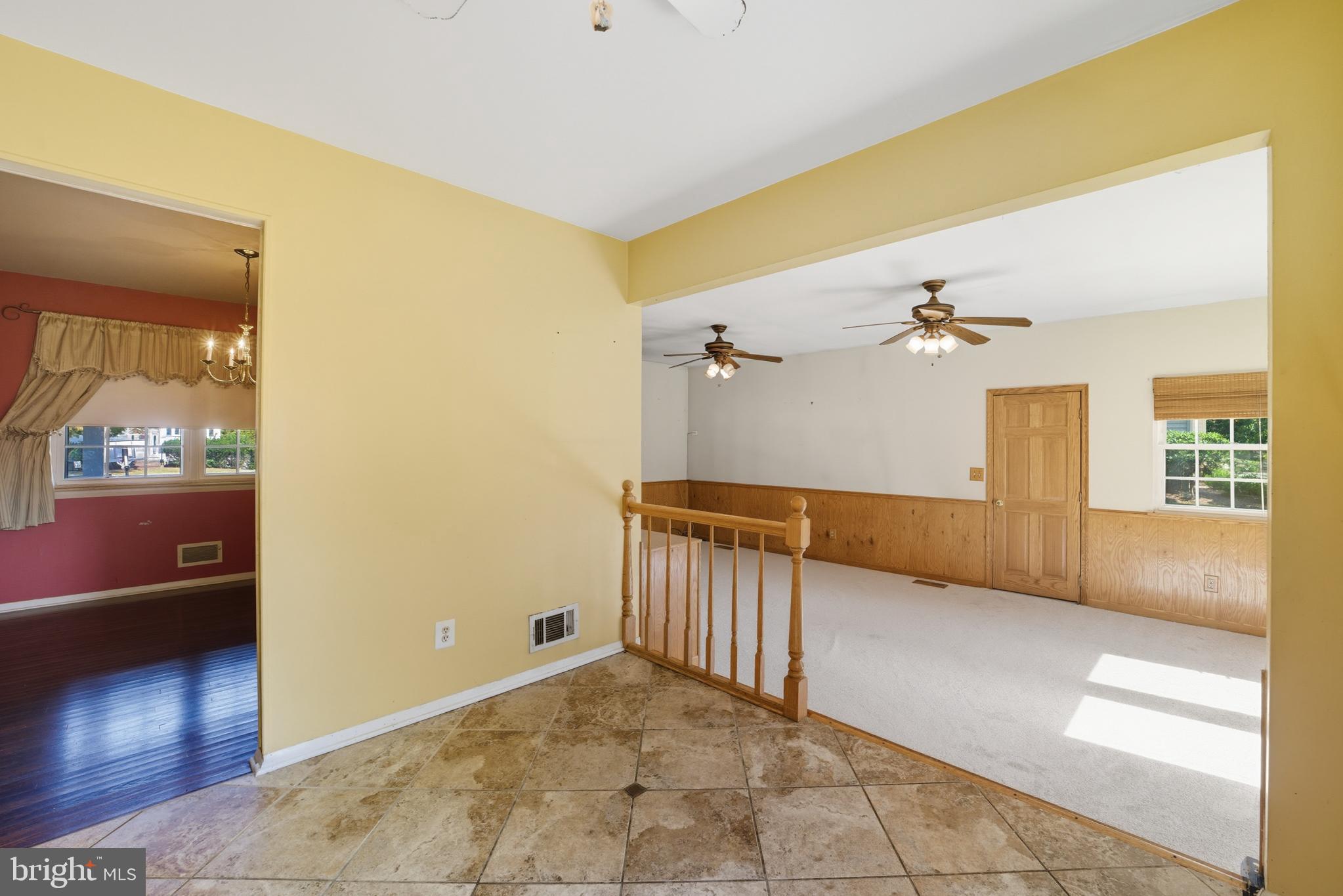 5 Corey Drive Ewing, NJ 08618 - Photo 11 of 30 a view of a hallway with wooden floor and cabinet