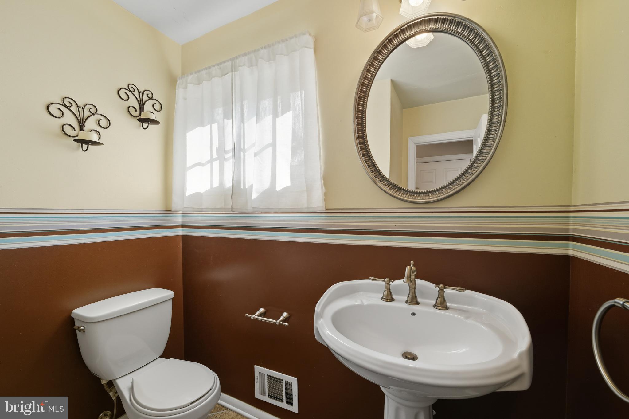 5 Corey Drive Ewing, NJ 08618 - Photo 12 of 30 a bathroom with a toilet sink and mirror