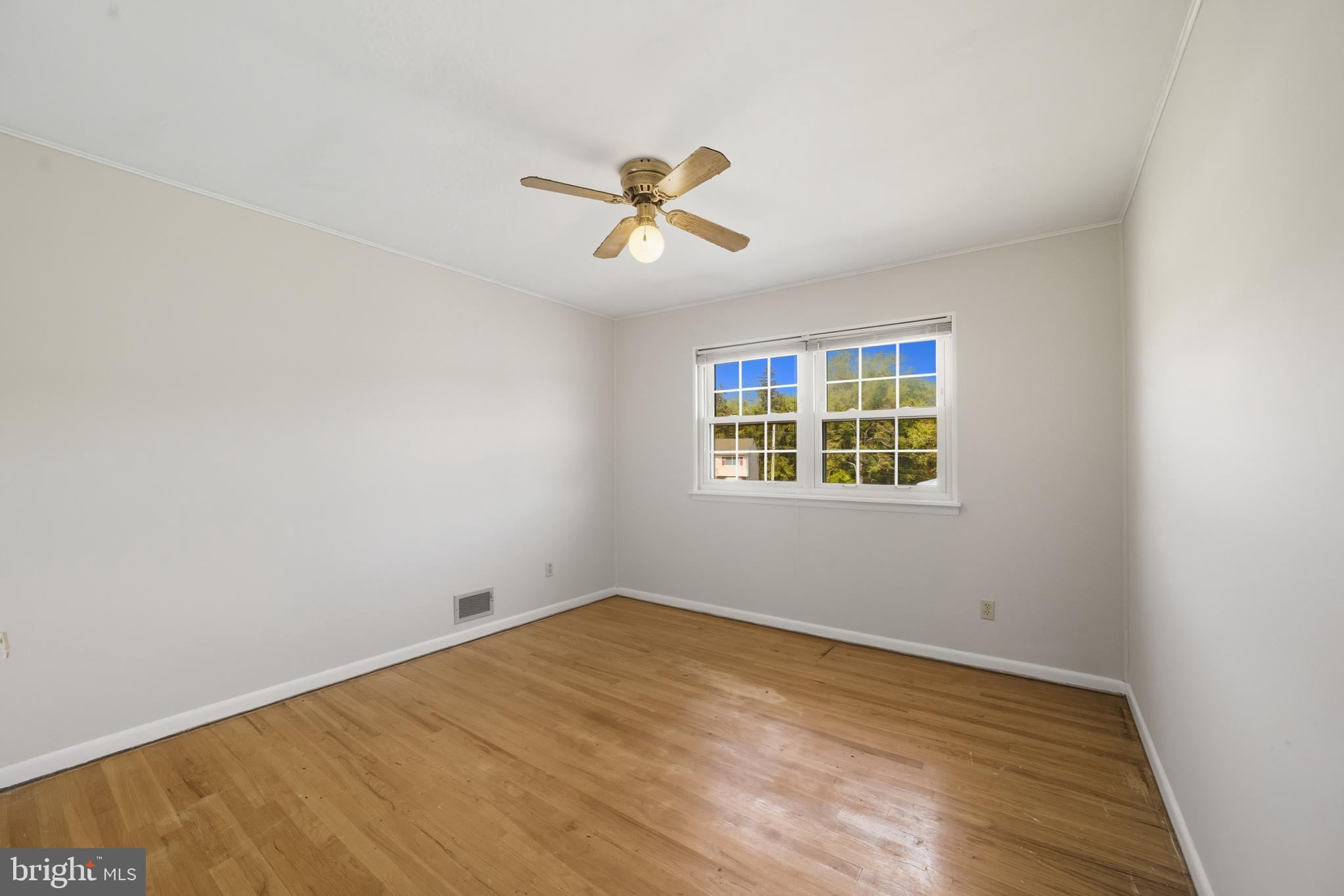5 Corey Drive Ewing, NJ 08618 - Photo 18 of 30 wooden floor in an empty room with a window