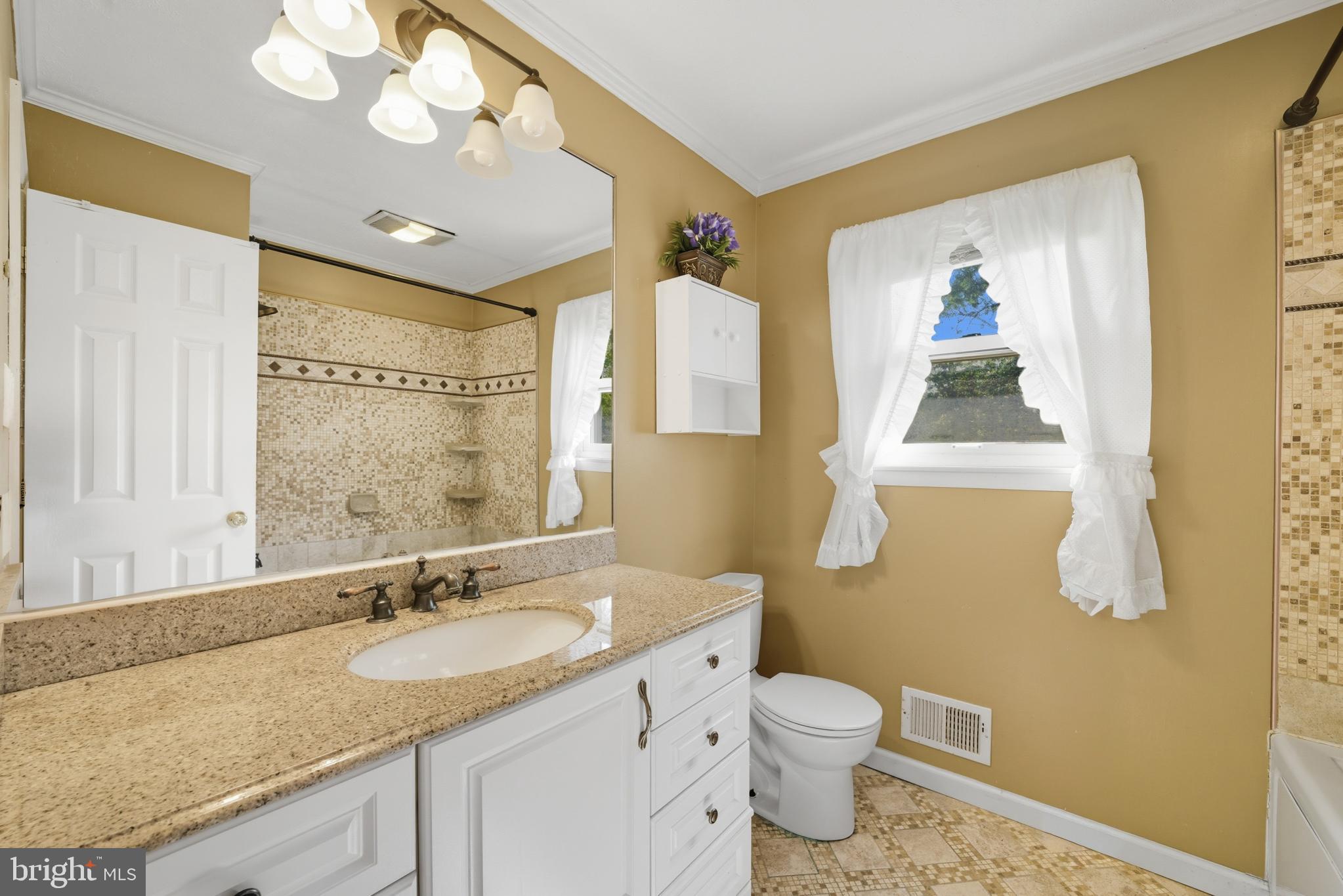 5 Corey Drive Ewing, NJ 08618 - Photo 24 of 30 a bathroom with a granite countertop sink mirror vanity and toilet