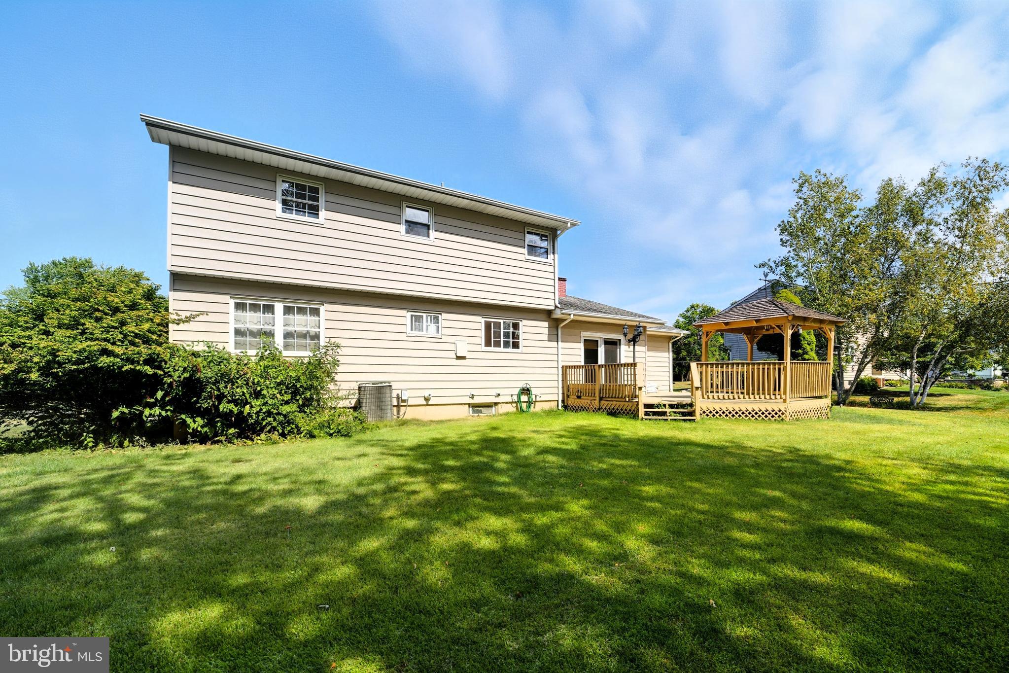 5 Corey Drive Ewing, NJ 08618 - Photo 28 of 30 a front view of a house with a yard