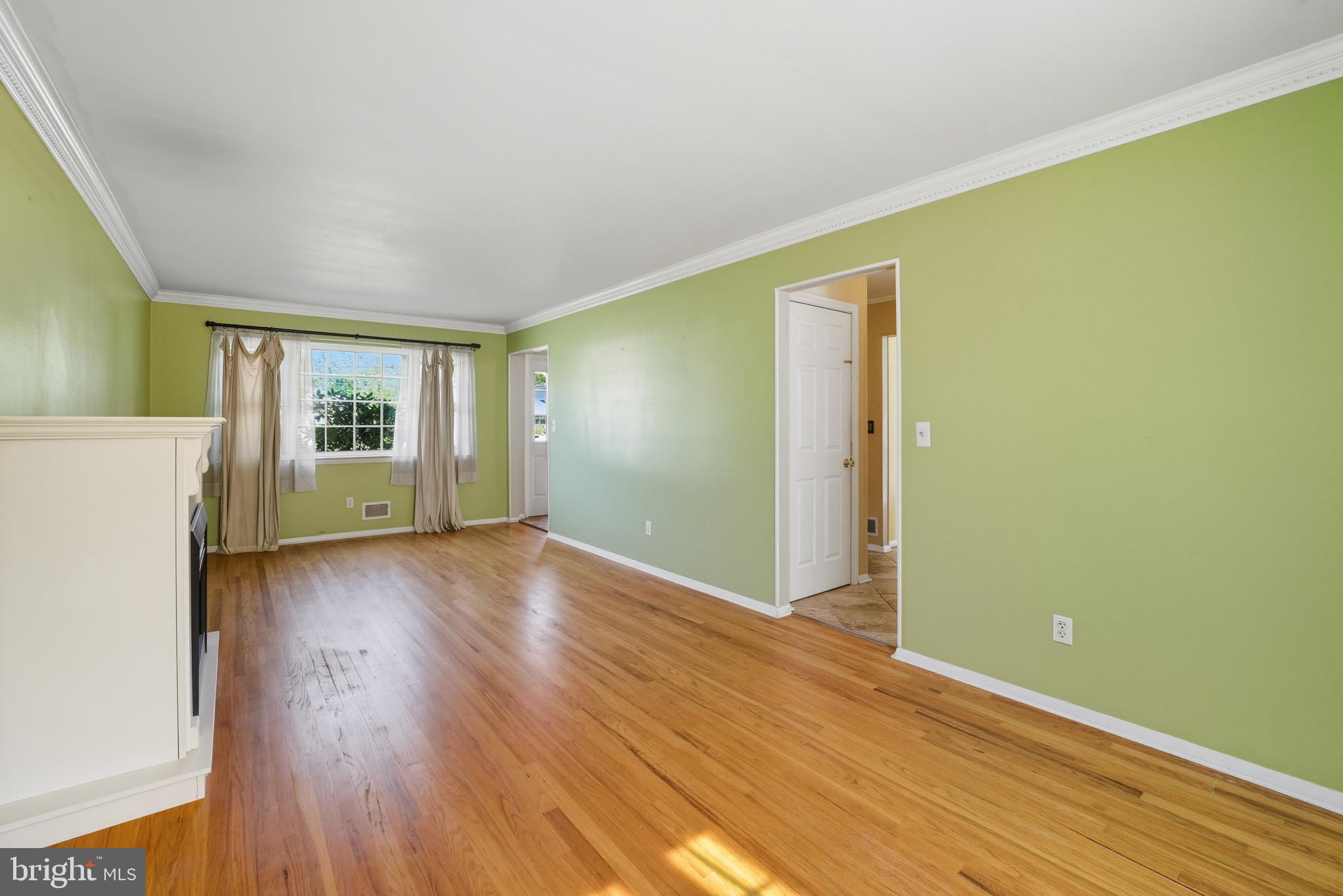 5 Corey Drive Ewing, NJ 08618 - Photo 7 of 30 an empty room with wooden floor and windows