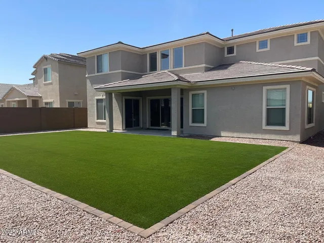 a view of a building with a garden