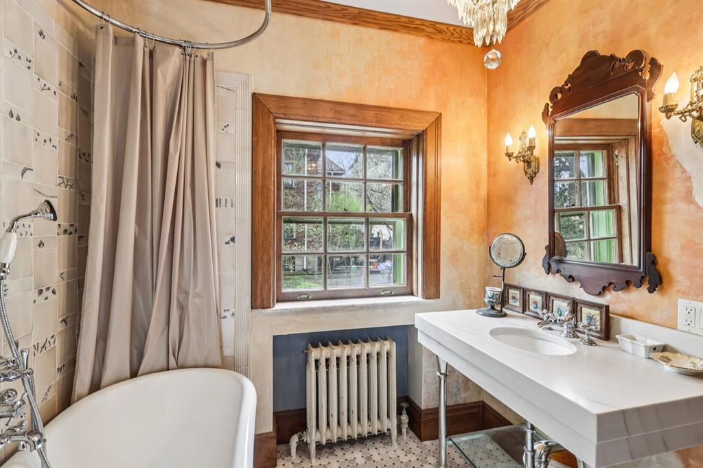 4352 Centre Avenue Pittsburgh, PA 15213 - Photo 17 of 45 a bathroom with a sink and a mirror