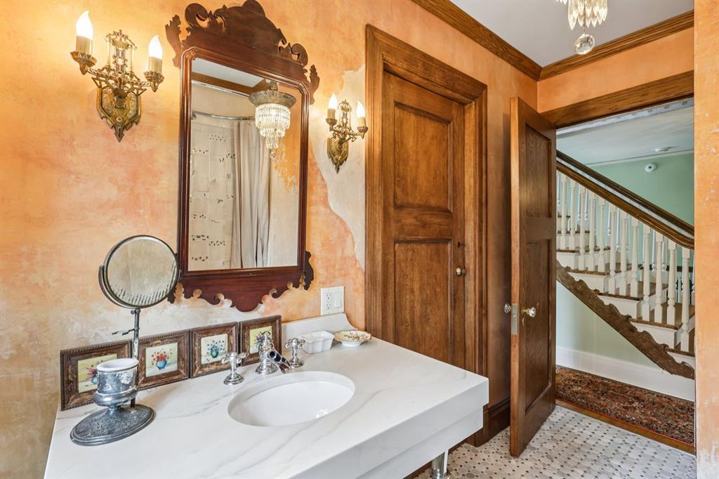 4352 Centre Avenue Pittsburgh, PA 15213 - Photo 18 of 45 a bathroom with 2 sink and a mirror