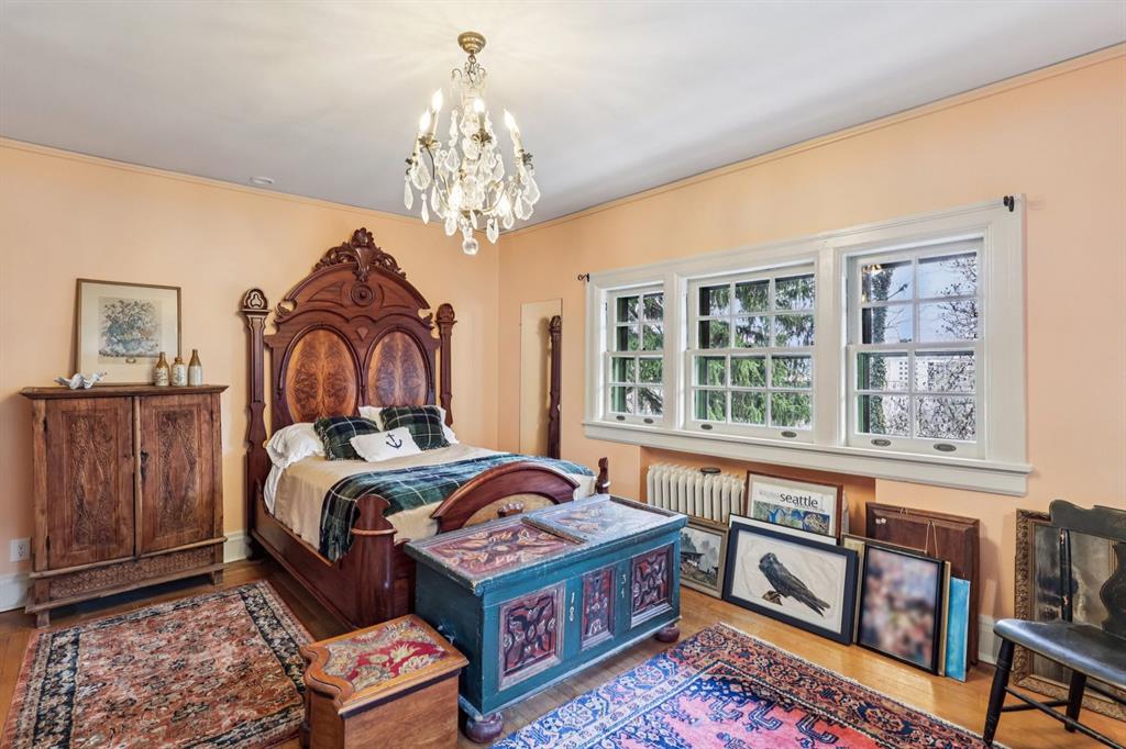 4352 Centre Avenue Pittsburgh, PA 15213 - Photo 19 of 45 a bed sitting in a bedroom next to a window