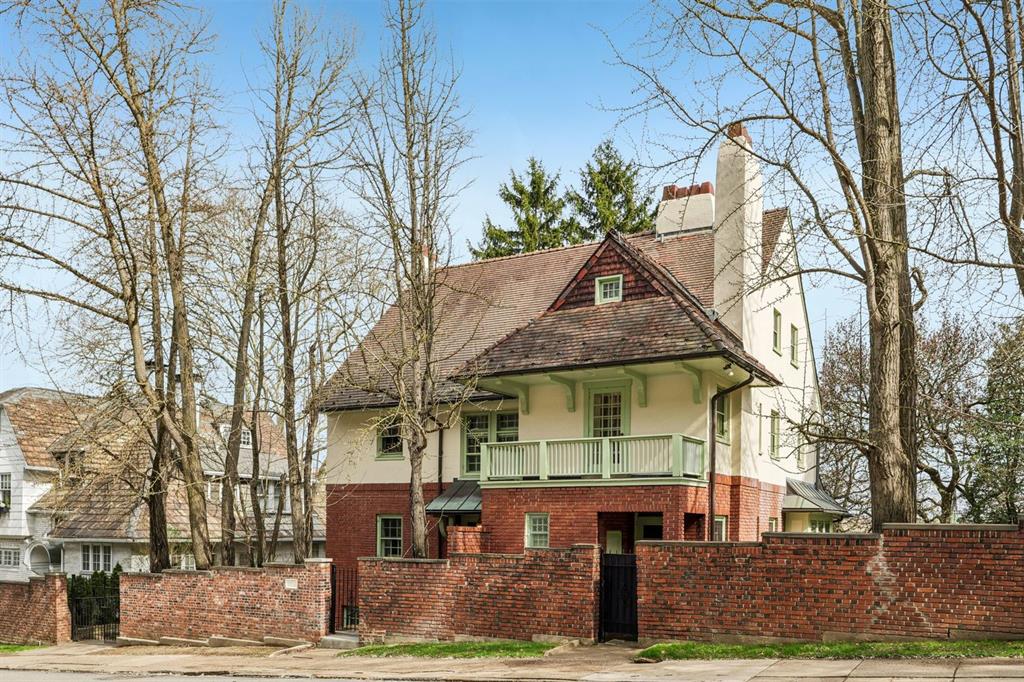 4352 Centre Avenue Pittsburgh, PA 15213 - Photo 2 of 45 a view of a white house with large tree