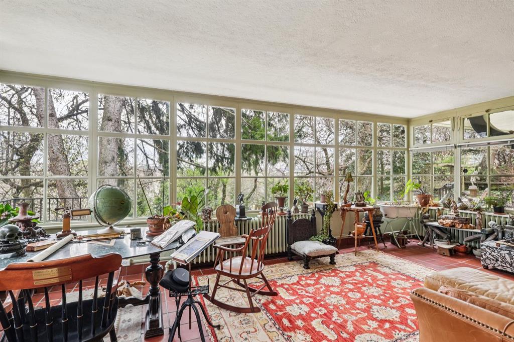 4352 Centre Avenue Pittsburgh, PA 15213 - Photo 37 of 45 a living room with furniture and a floor to ceiling window