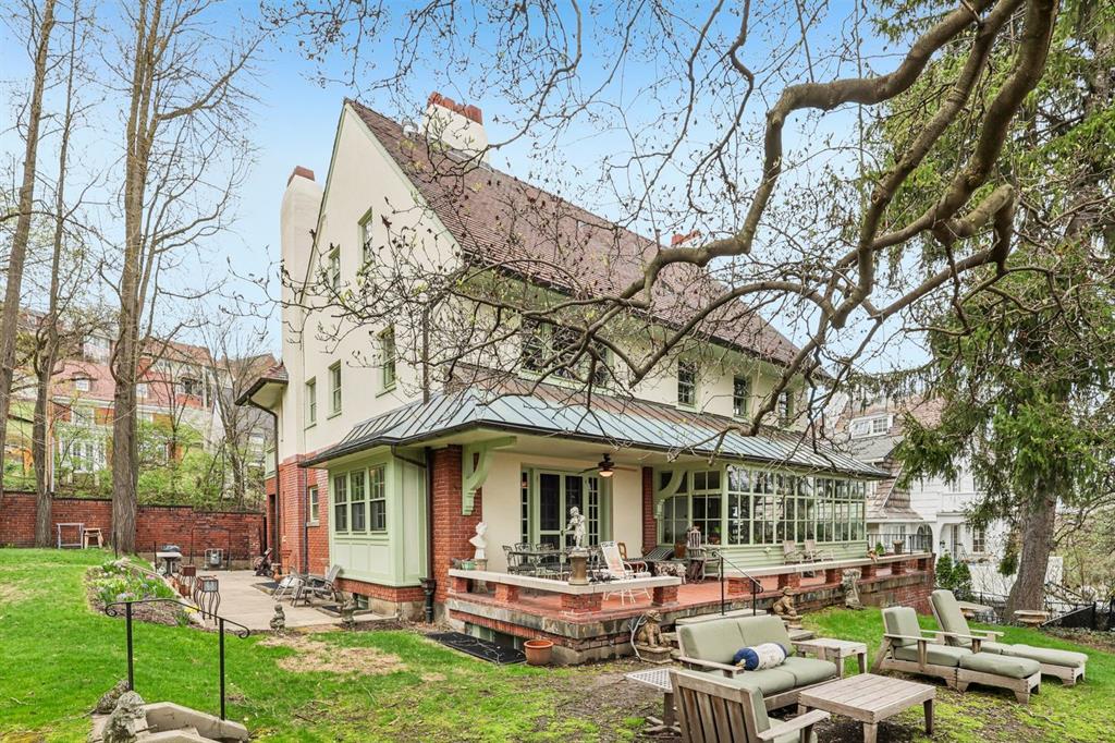 4352 Centre Avenue Pittsburgh, PA 15213 - Photo 43 of 45 a front view of a house with garden and trees