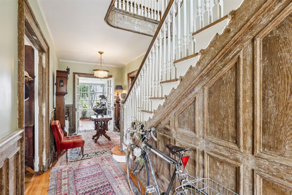 4352 Centre Avenue Pittsburgh, PA 15213 - Photo 5 of 45 a view of an entryway with wooden floor and windows