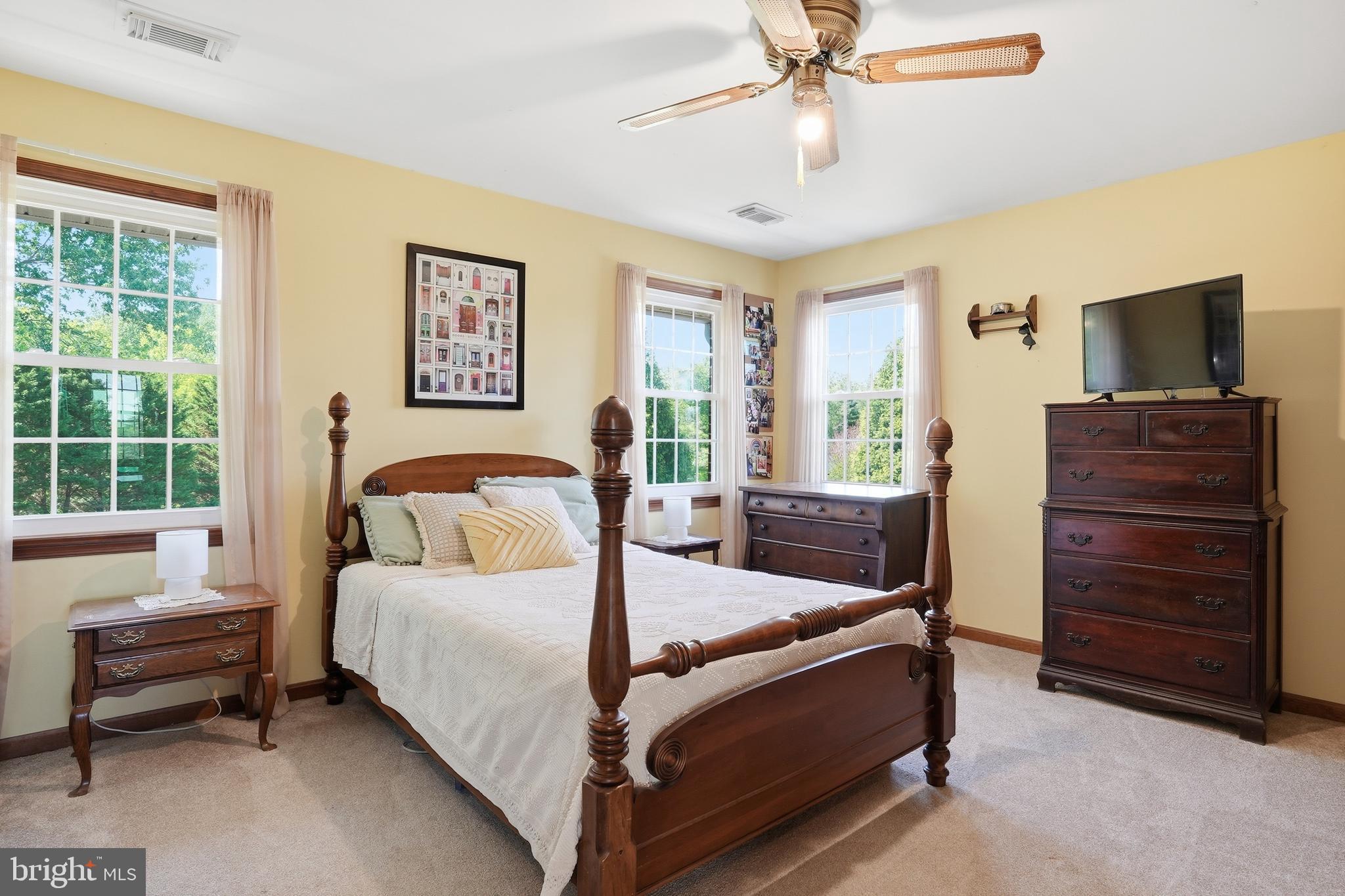6118 Fishers Station Road Lothian, MD 20711 - Photo 26 of 62 a bedroom with a bed and a couch