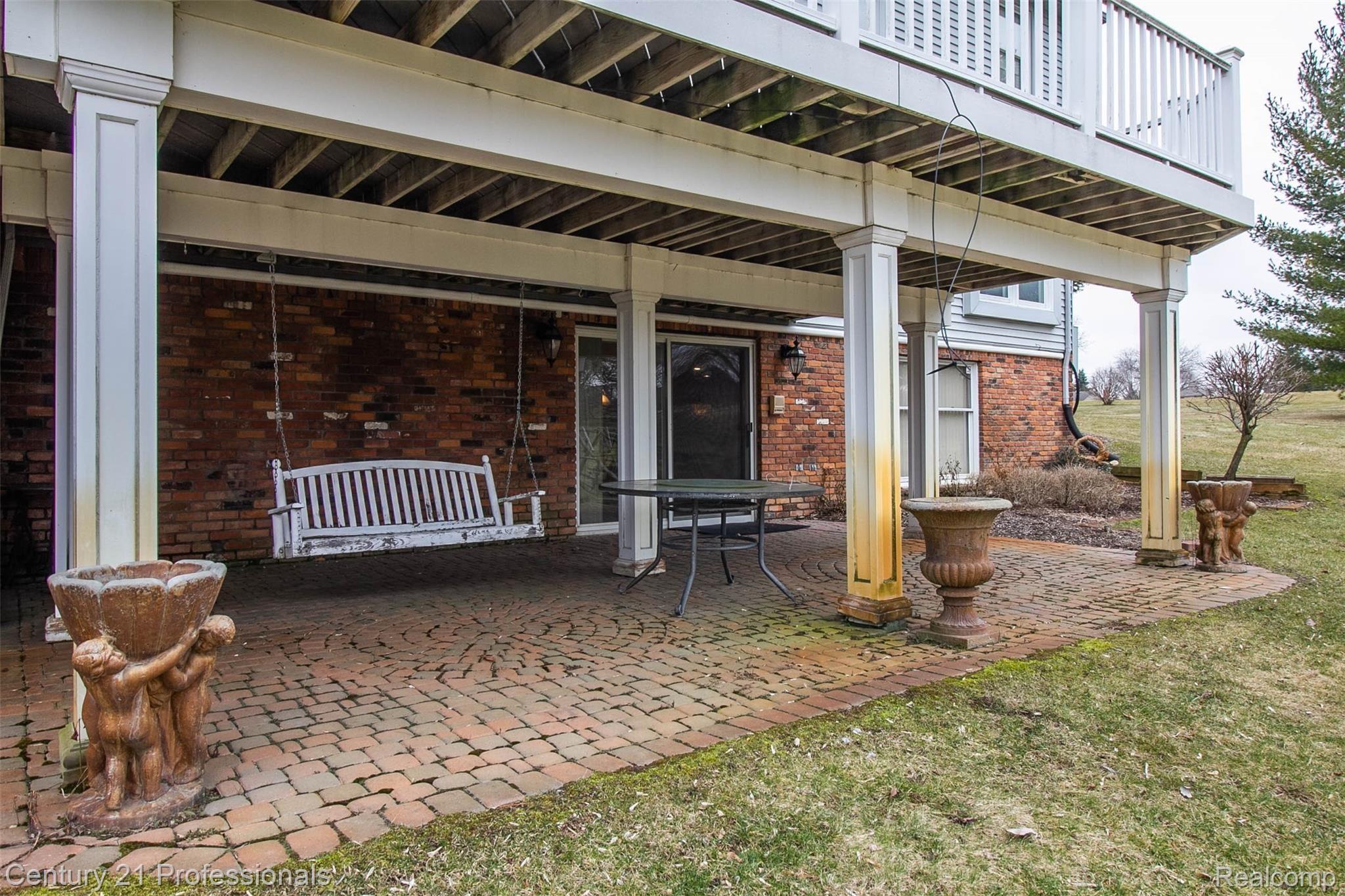 69401 Eldred Road Romeo, MI 48065 - Photo 60 of 65 brick paver patio outside of walkout lower level