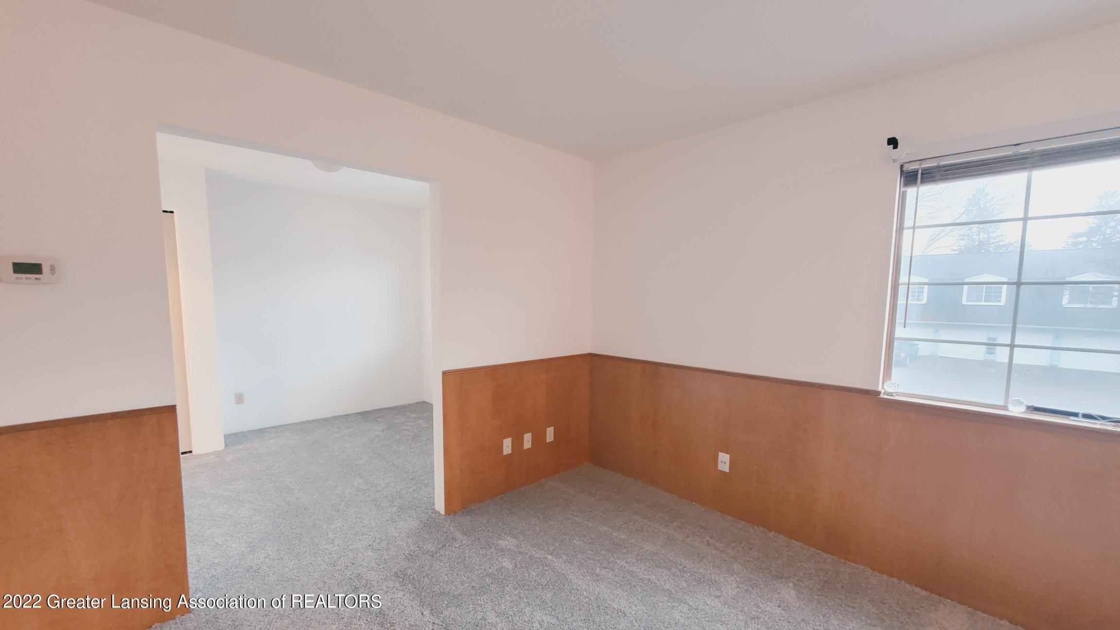 3928 Hunters Ridge Drive, Unit 3 Lansing, MI 48911 - Photo 7 of 16 20221214_161352