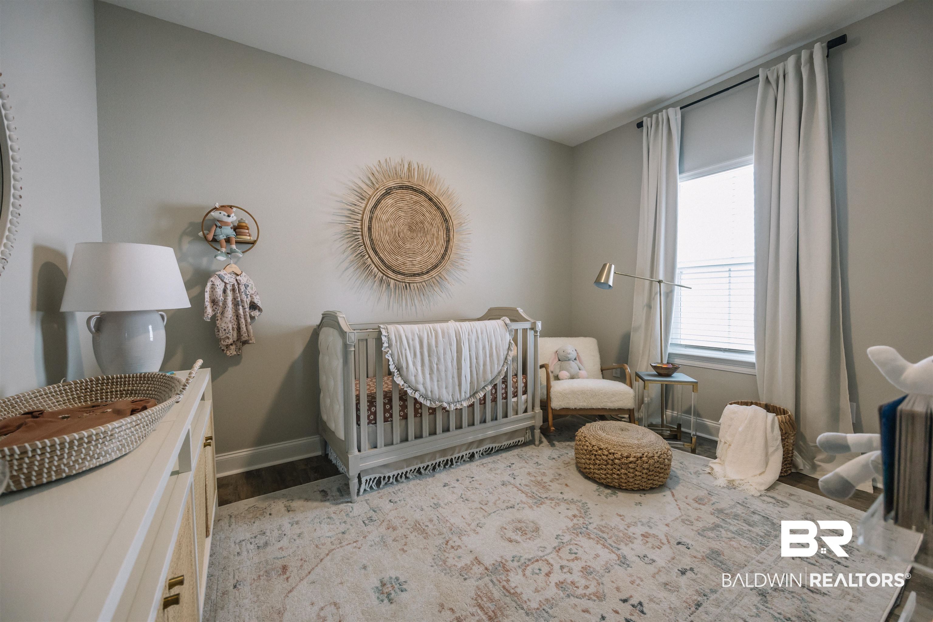12894 Flanagan Street Elberta, AL 36530 - Photo 5 of 29 Bedroom with light wood-type flooring and a crib