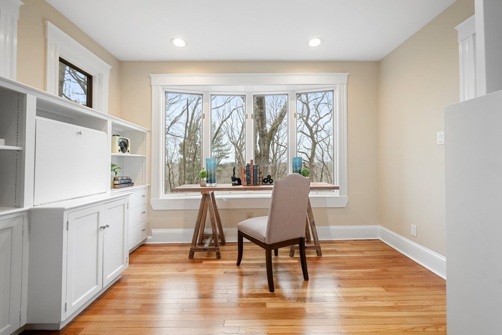 93 Wolcott Road Brookline, MA 02467 - Photo 3 of 41 a view of a dining room with furniture window and wooden floor