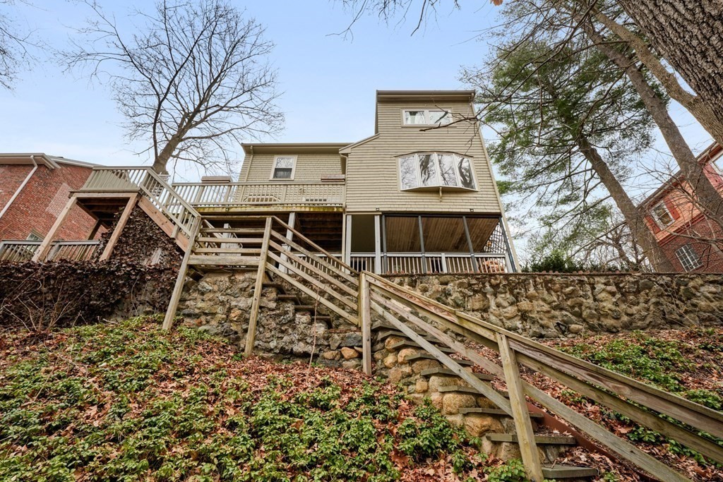 93 Wolcott Road Brookline, MA 02467 - Photo 38 of 41 front view of a house with a large window