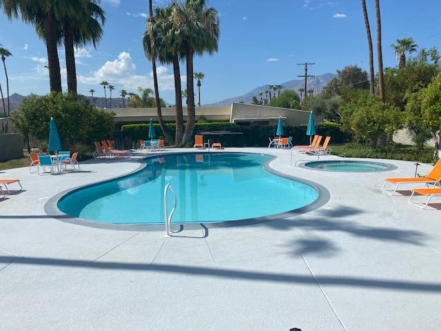 1111 East Ramon Road, Unit 10 Palm Springs, CA 92264 - Photo 23 of 23 a view of a swimming pool with a patio