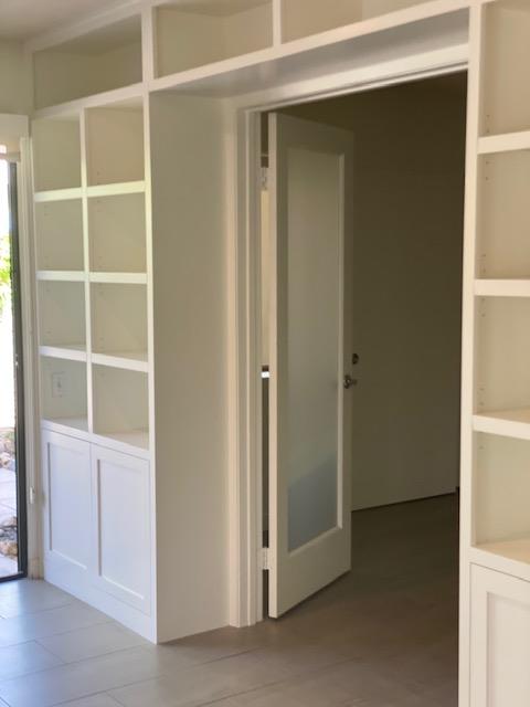 1111 East Ramon Road, Unit 10 Palm Springs, CA 92264 - Photo 5 of 23 a view of an empty walk in closet