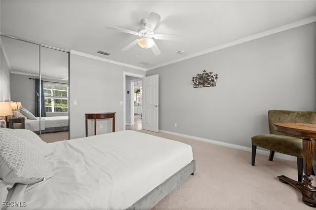 a spacious bathroom with a shower sink mirror and toilet