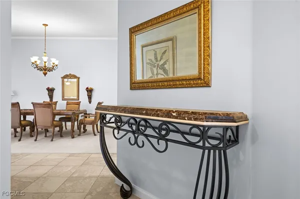 a utility room with cabinets washer and dryer