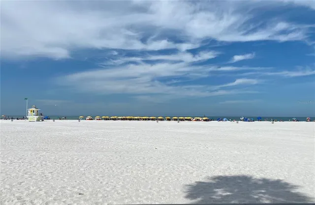 a view of beach and city