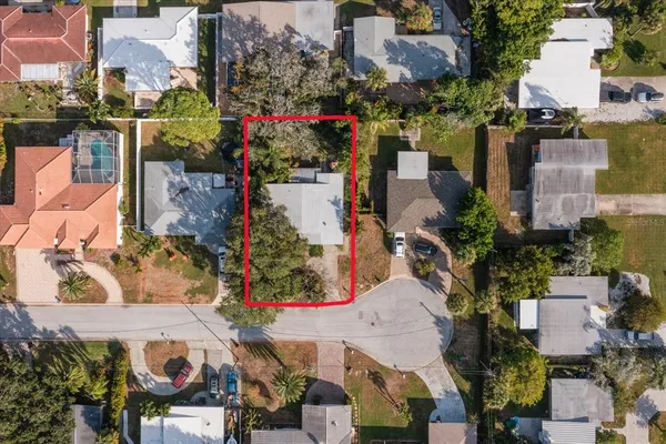 an aerial view of houses and roads