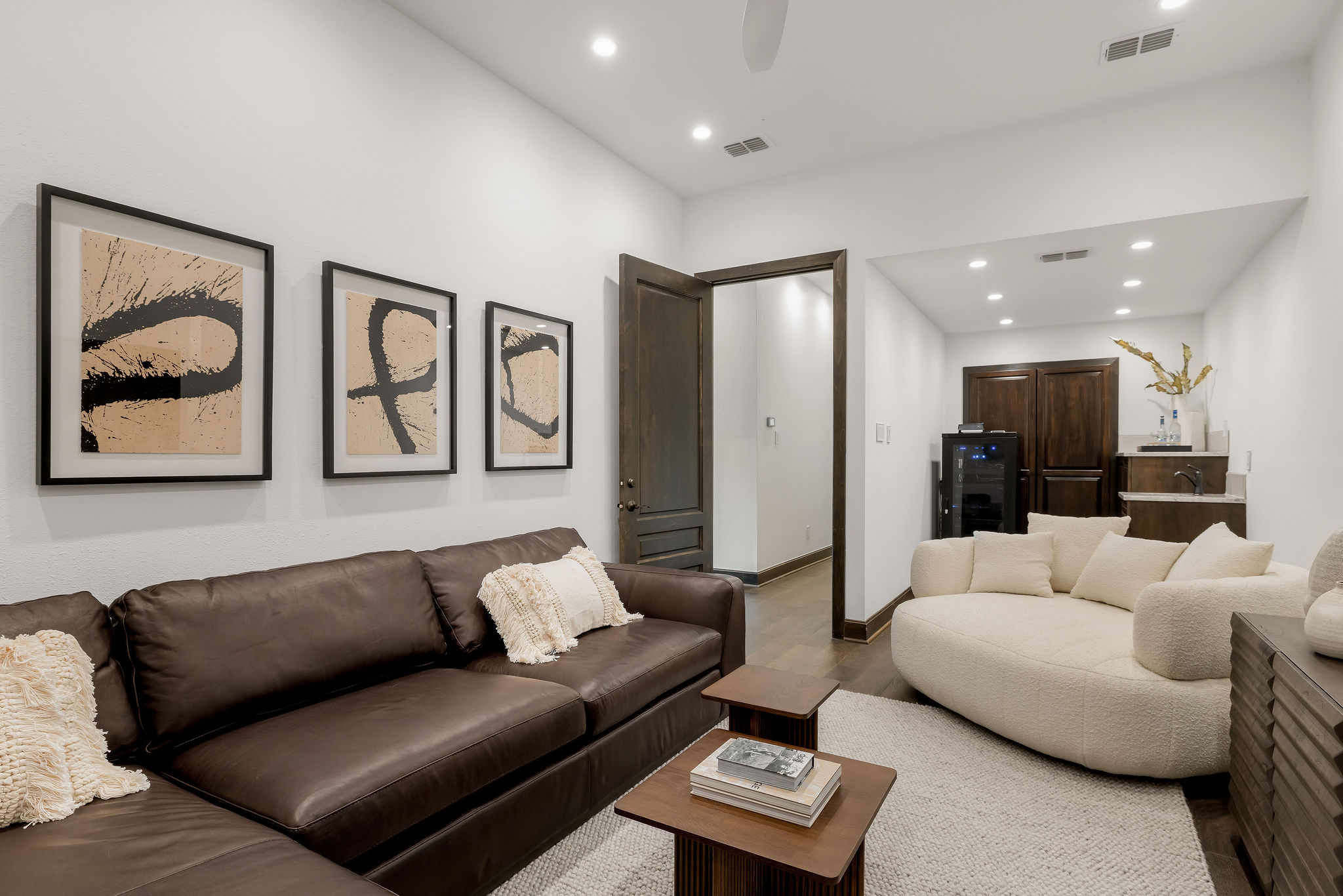 11928 Musket Rim Street Austin, TX 78738 - Photo 32 of 39 a living room with furniture and a glass door