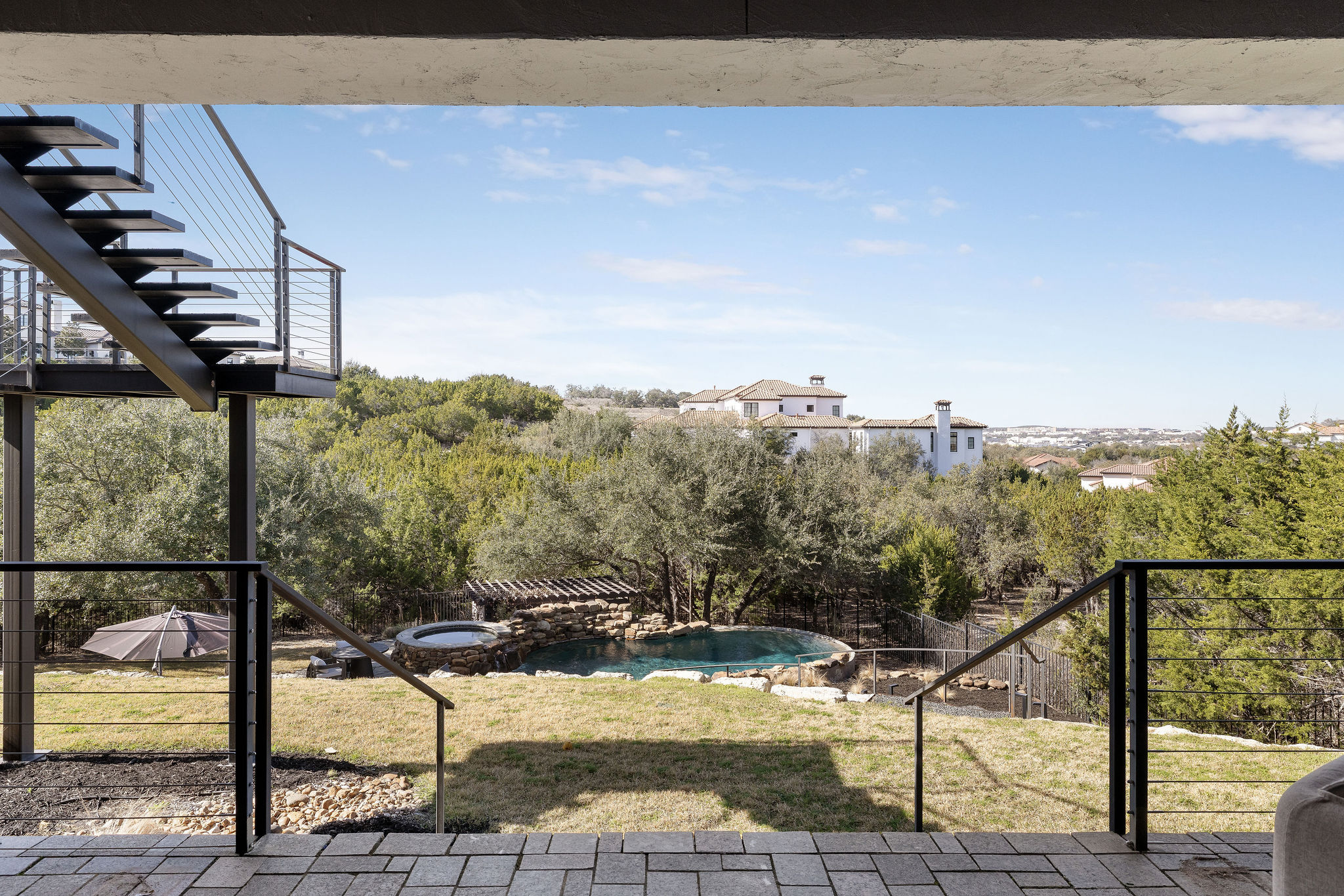 11928 Musket Rim Street Austin, TX 78738 - Photo 35 of 39 a view of a balcony