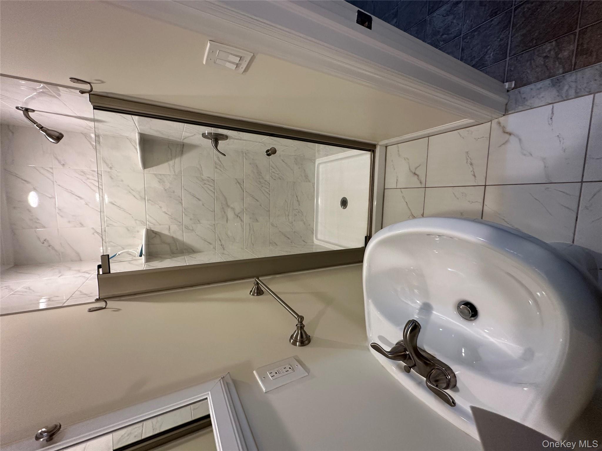 18 West Maple Avenue Suffern, NY 10901 - Photo 15 of 24 Renovated Full Bathroom with light tile floors and a shower stall