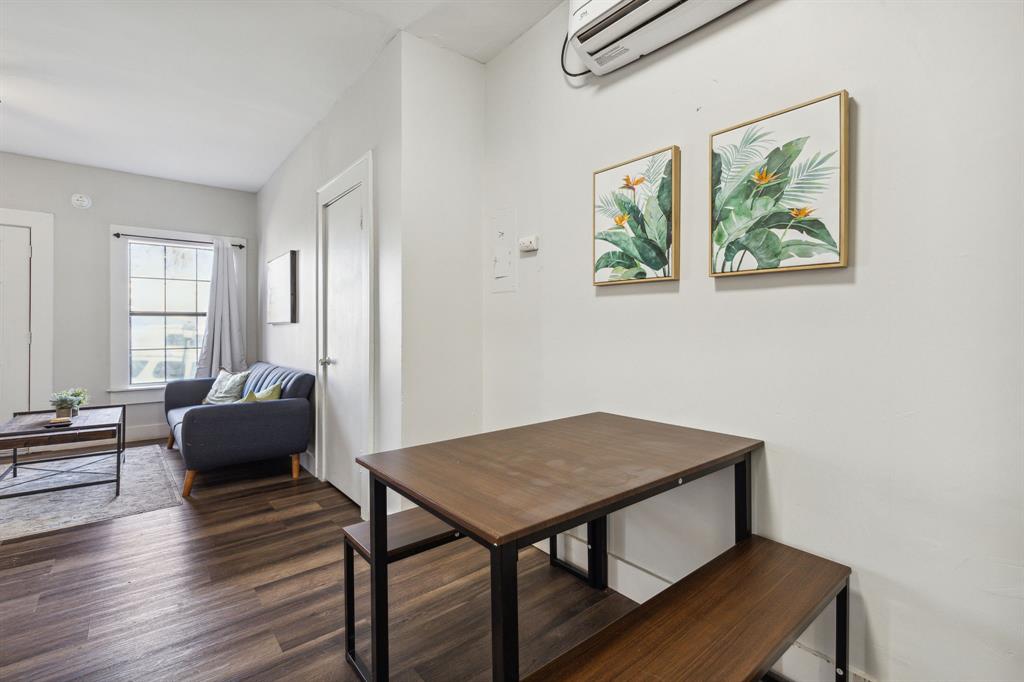 112 West Eighth Street Dallas, TX 75208 - Photo 33 of 34 a view of a livingroom with furniture and wooden floor