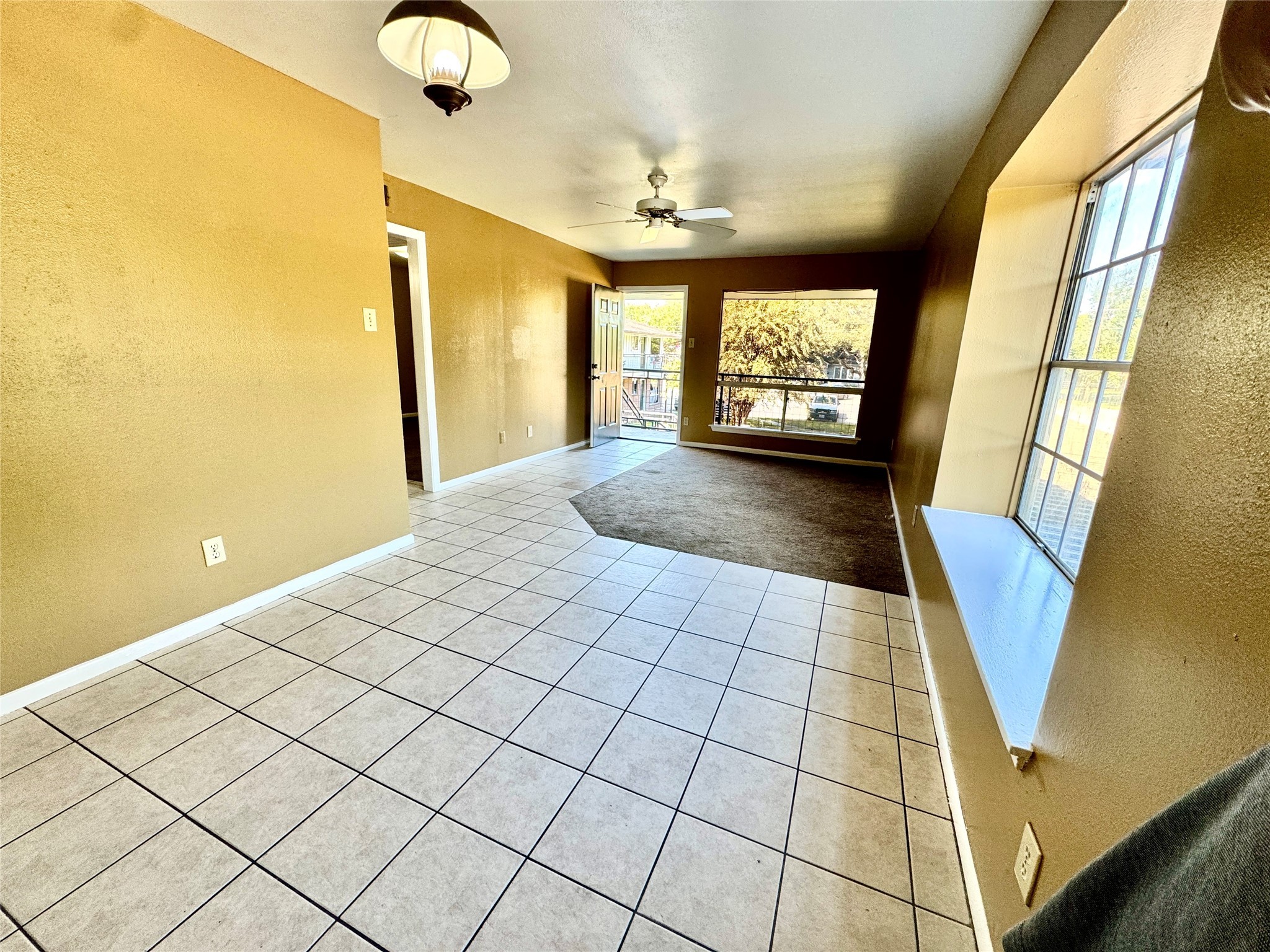 2201 North Grand Boulevard, Unit 2 Pearland, TX 77581 - Photo 7 of 9 a view of an empty room and window