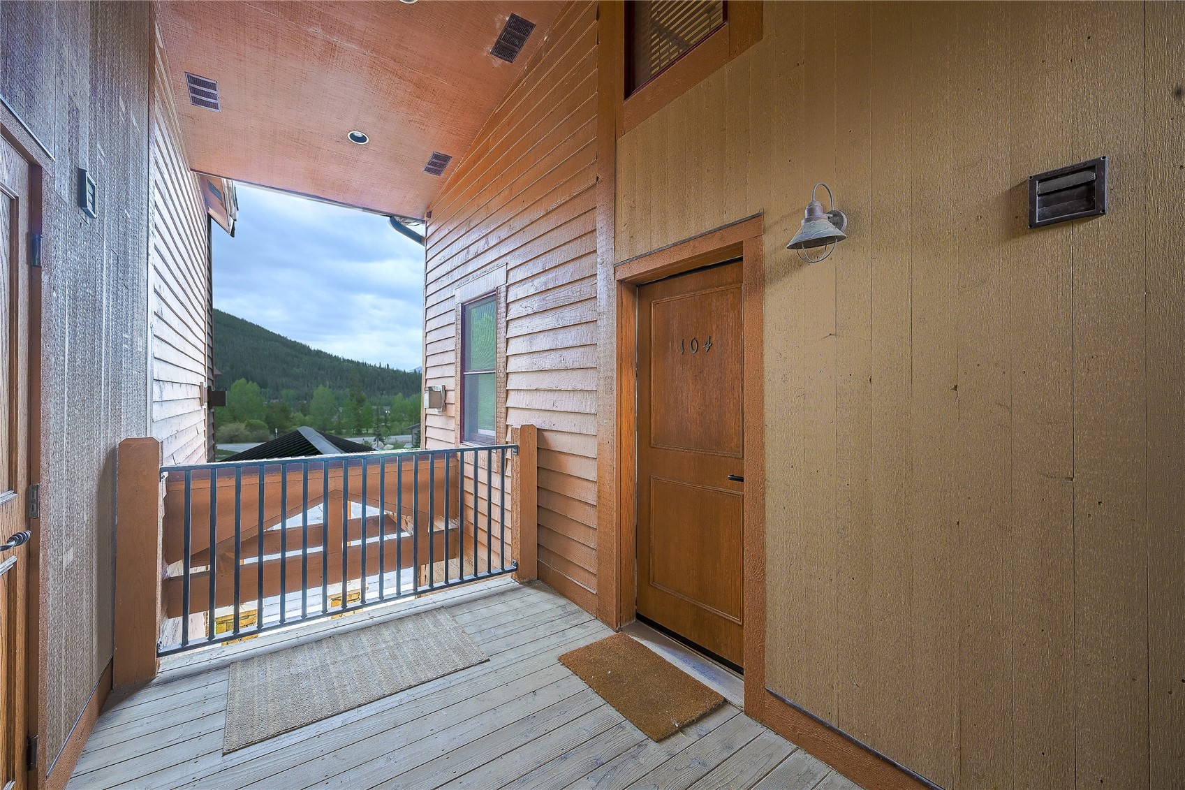 63 Antlers Gulch Road, Unit 104 Keystone, CO 80435 - Photo 18 of 23 Covered entry way.